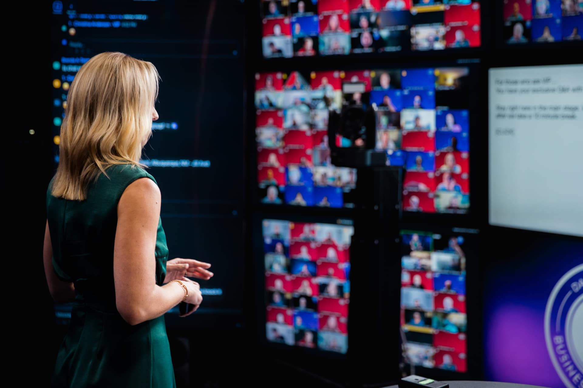 Alison Ray hosting a virtual program in front of a wall of participant screens